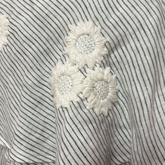 Elegant Ruffled Striped Mini Dress with Floral Details - Picture 8 of 9